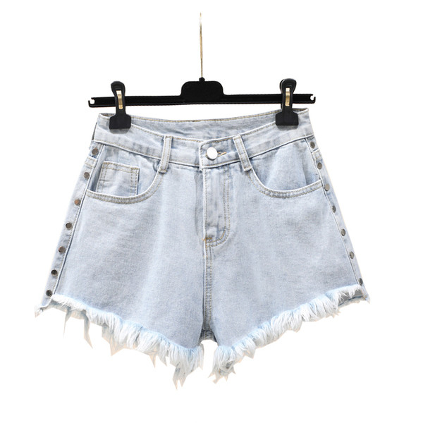 Naiste lühikeste teksade lai mudel kõrge vöökoha ja taskutega