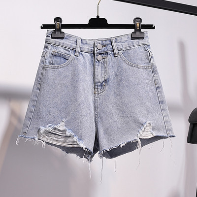 Īsi sieviešu džinsi ar kabatām un saplēstiem motīviem