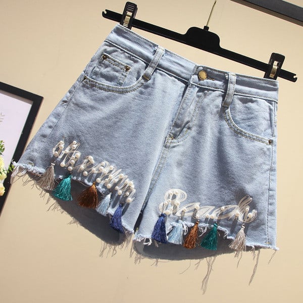 Sieviešu īsie džinsi ar pērlēm un pušķiem