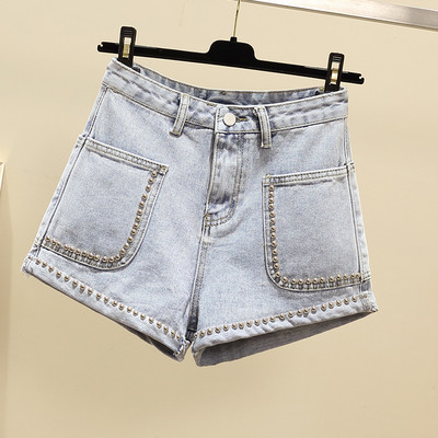 Naiste lühikesed aasade ja taskutega teksad