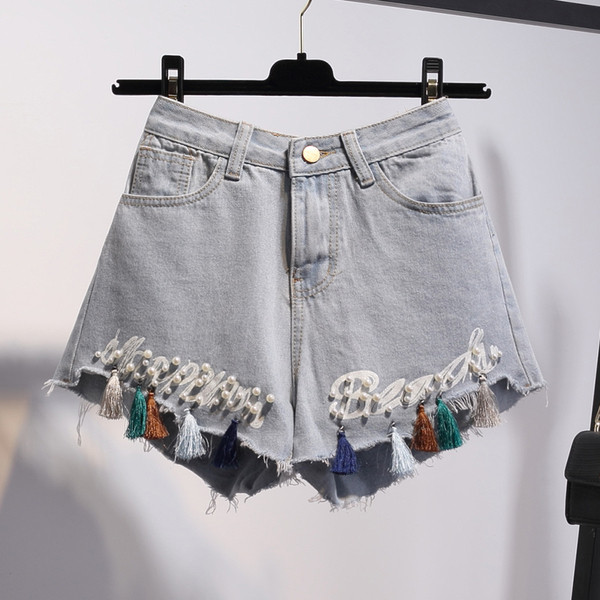 Модерни къси дънки с бродерия и пискюли