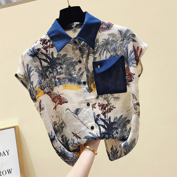 Pašreizējais sieviešu krāsains krekls ar īsām piedurknēm un kabatu