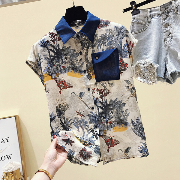 Pašreizējais sieviešu krāsains krekls ar īsām piedurknēm un kabatu