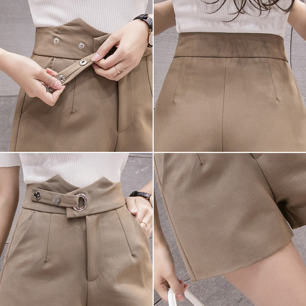 Pašreizējie šorti ar augstu vidukli un kabatām