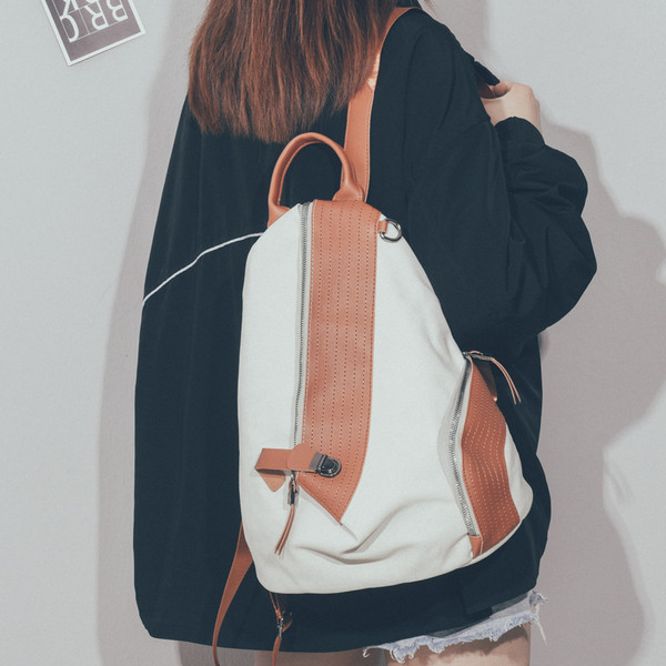 Pašreizējā sieviešu mugursoma ar rāvējslēdzēju