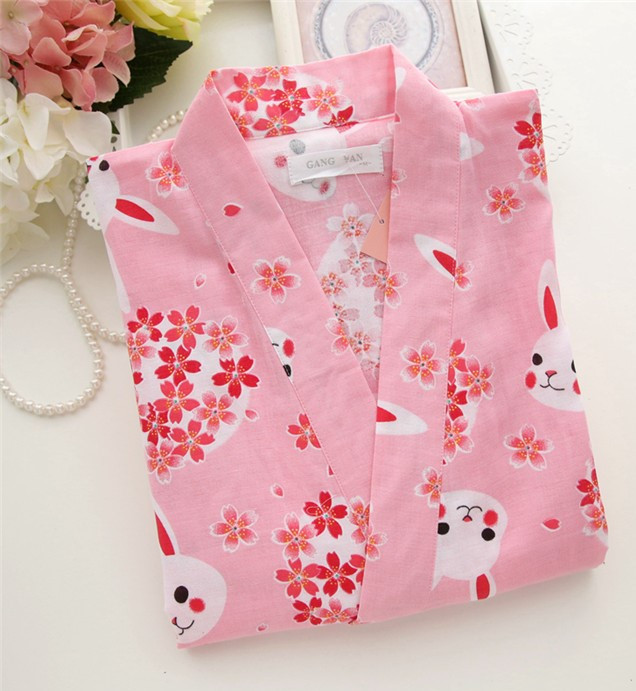 Sieviešu peldmētelis ar apdruku un saitēm