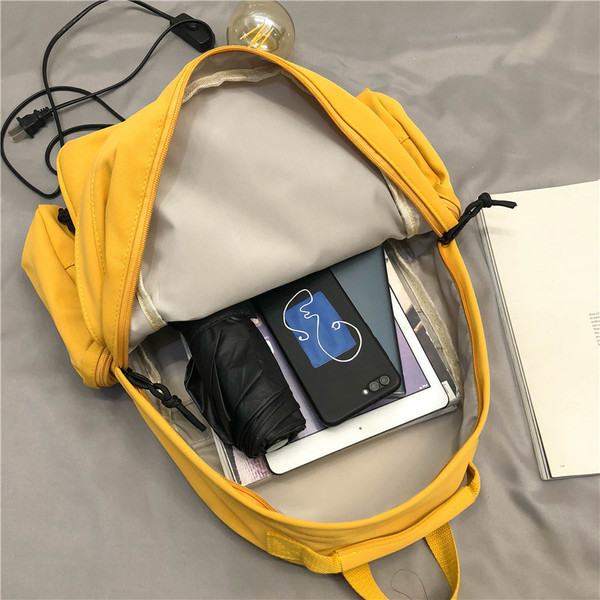 Naiste igapäevane taskute ja sangaga seljakott