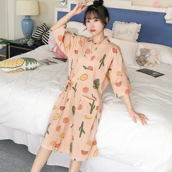 Sieviešu peldmētelis ar saitēm un apdruku