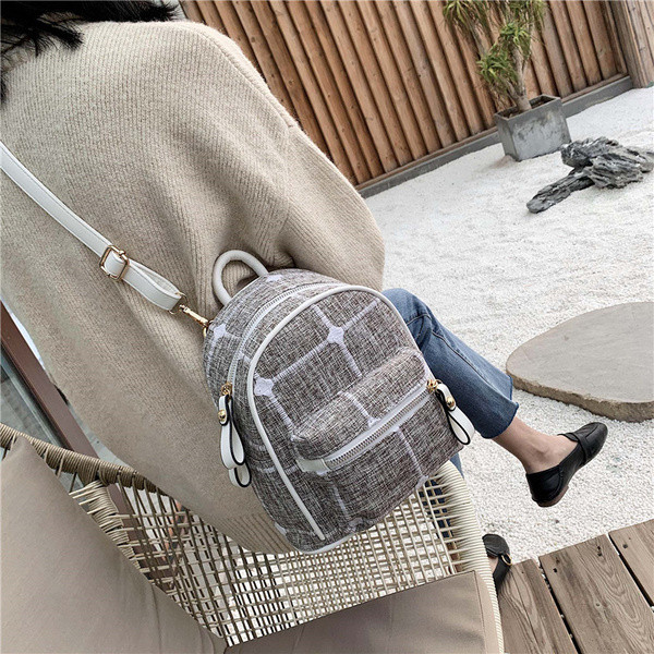 Naiste kaasaegne miniseljakott lukuga