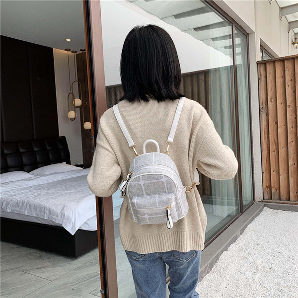 Naiste kaasaegne miniseljakott lukuga