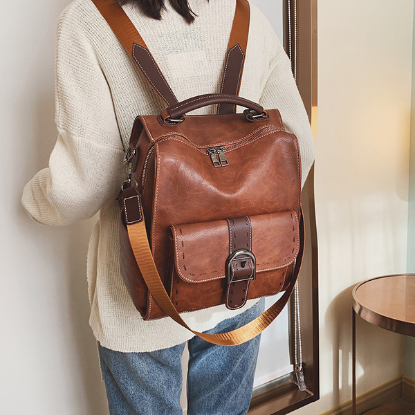 Sieviešu ikdienas mugursoma no eko ādas ar rokturi