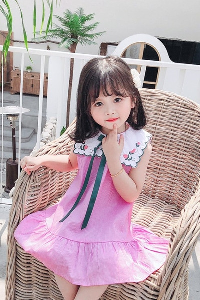 Tikandite ja paelaga suvine lastekleit