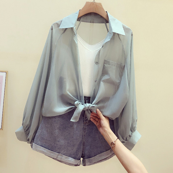 Sihuke klassikalise krae, pikkade varrukate ja lipsudega naiste särk