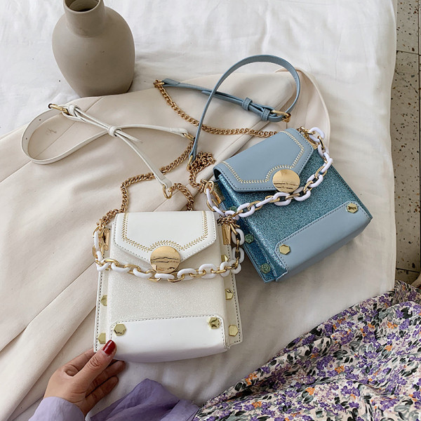 Stiilne naiste metallist elementidega kott ökonahast