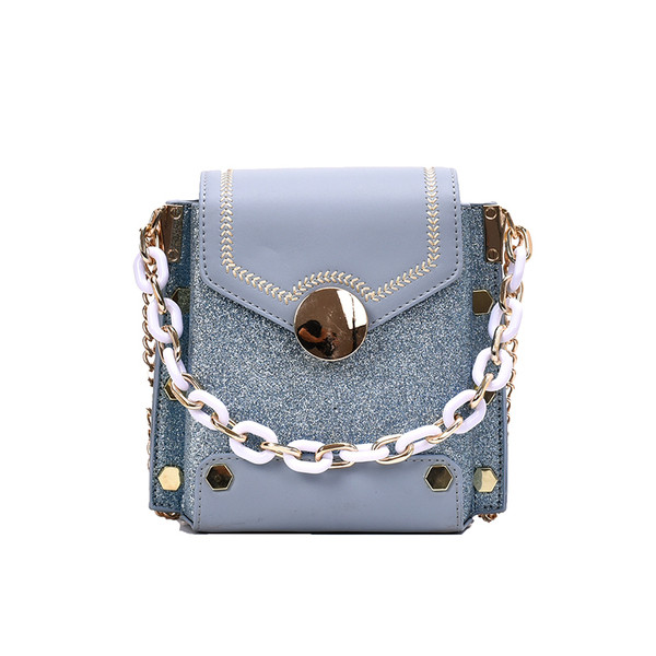 Stiilne naiste metallist elementidega kott ökonahast