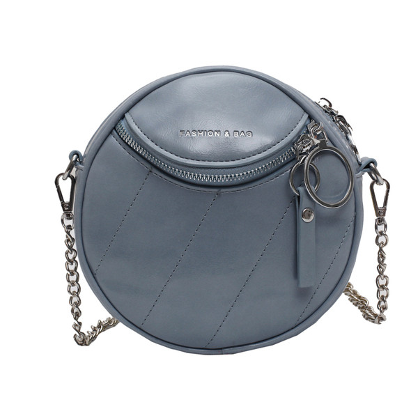 Öko bőrből készült, kerek alakú női topiktáska