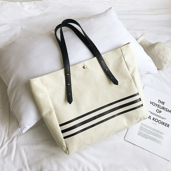 Ikdienas sieviešu soma ar gariem rokturiem