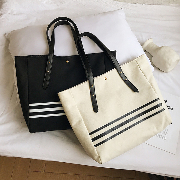 Ikdienas sieviešu soma ar gariem rokturiem