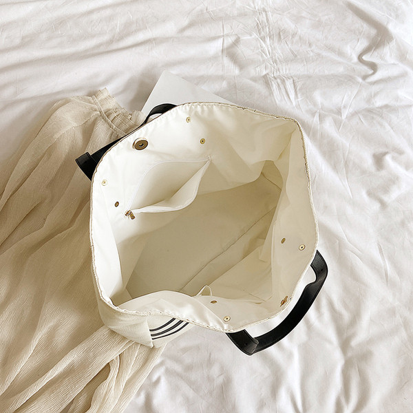 Ikdienas sieviešu soma ar gariem rokturiem