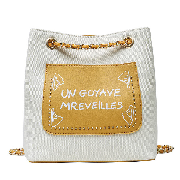 Dāmas plecu soma ar garu rokturi un uzrakstiem