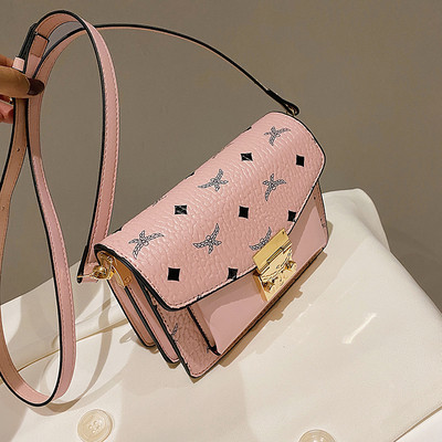 Sieviešu maza mākslīgās ādas soma ar metāla elementu un garu rokturi