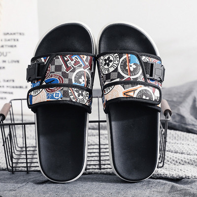 Modernas vīriešu čības ar plakanu zoli un krāsainu rakstu