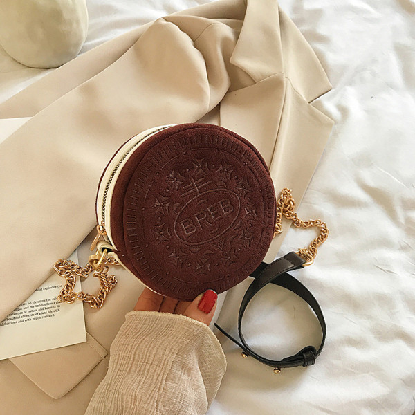 Kaasaegne ümara kujuga naistekott