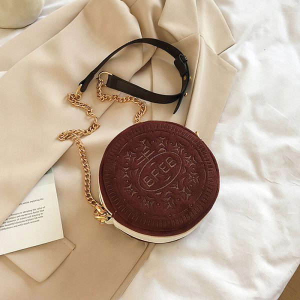 Kaasaegne ümara kujuga naistekott