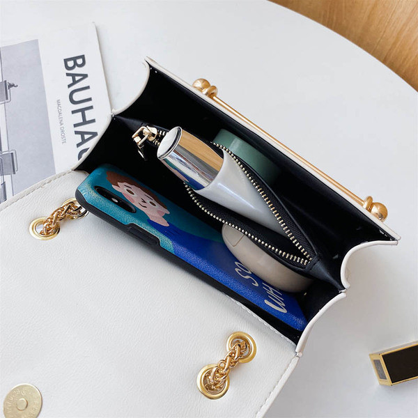 Sieviešu moderna eko-ādas soma ar metāla rokturi