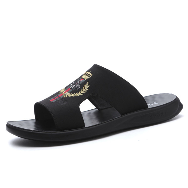 Mustad värvilise tikandiga meeste sussid