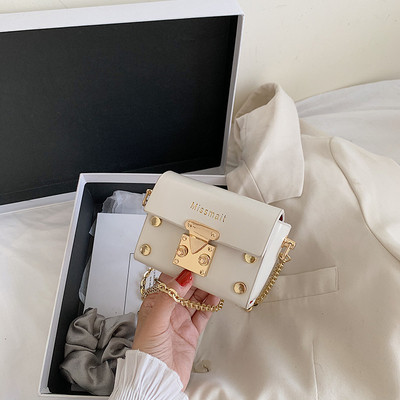 Mini sieviešu soma ar garu rokturi un metāla elementiem