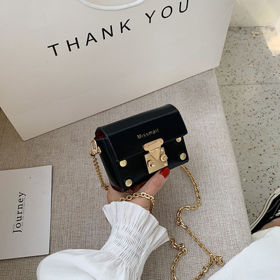 Mini sieviešu soma ar garu rokturi un metāla elementiem