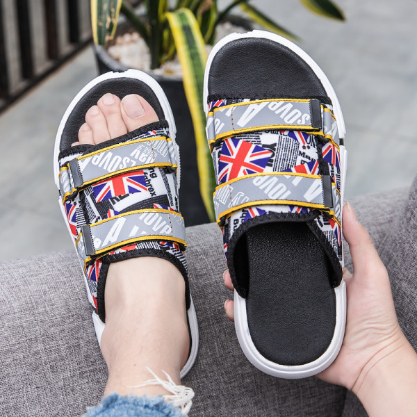 Krāsainas vīriešu čības ar plakanu zoli un uzrakstu