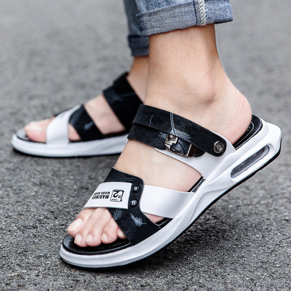 Modernas vīriešu čības ar krāsainu rakstu uz lapām un gaisa kameru