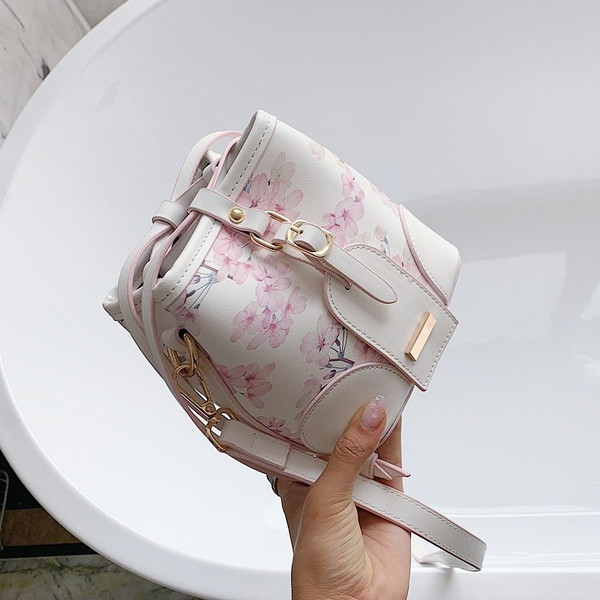 Mini sieviešu soma ar ziedu motīviem un garu rokturi