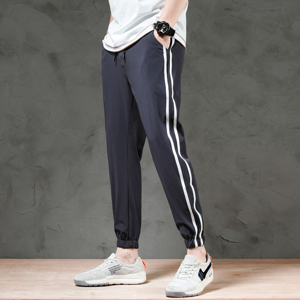 Kandi ja paeltega sportlikud ja vabaaja meeste püksid