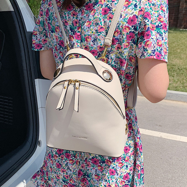 Stilīga sieviešu mugursoma no eko ādas ar uzrakstu