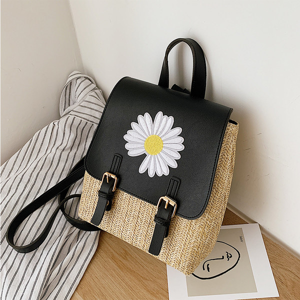 Stilīga sieviešu mugursoma ar ziedu elementu