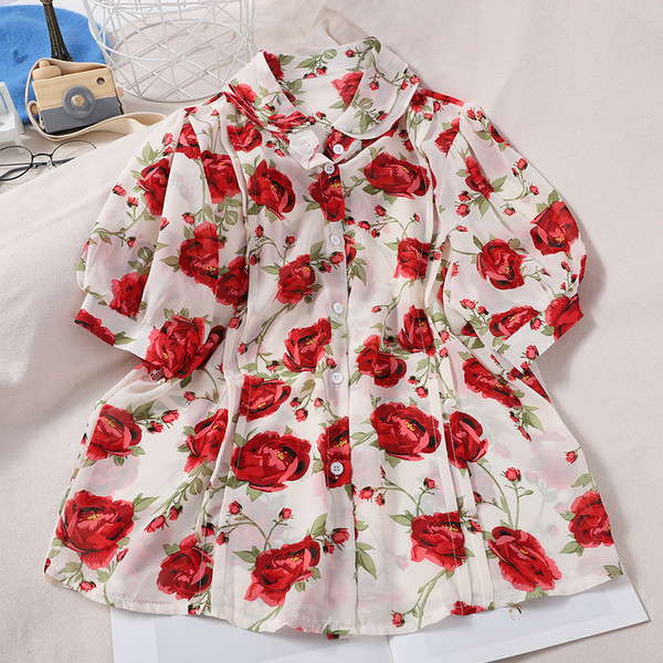 Suvine naiste särk klassikalise krae, lühikeste varrukate ja lillelise mustriga