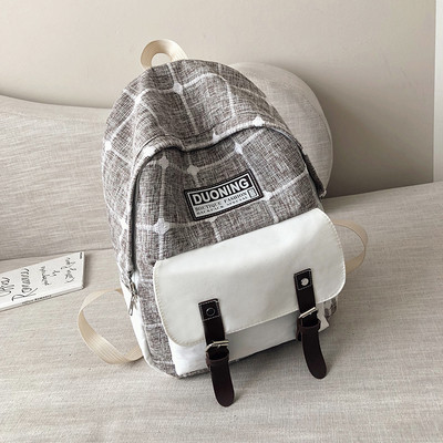 Sieviešu ikdienas rūtainā mugursoma ar uzrakstu