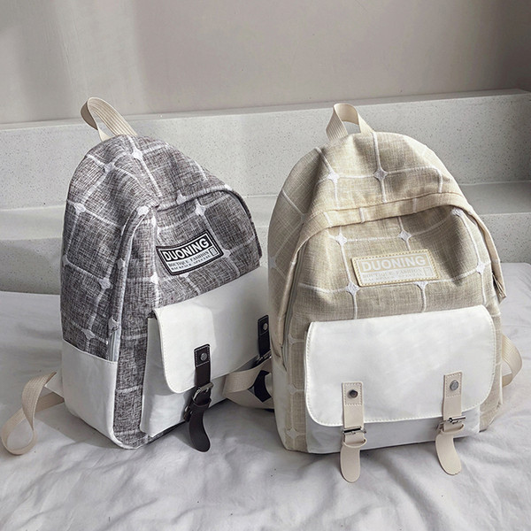 Sieviešu ikdienas rūtainā mugursoma ar uzrakstu