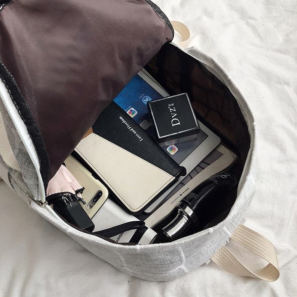 Sieviešu ikdienas rūtainā mugursoma ar uzrakstu