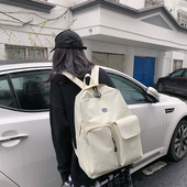 Sieviešu ikdienas mugursomas plats modelis ar kabatām priekšpusē