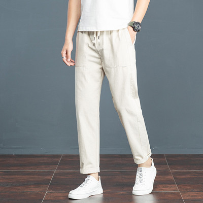 Meeste vabaaja püksid elastse vöökoha ja taskutega