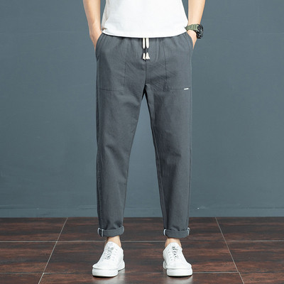 Meeste vabaaja püksid elastse vöökoha ja taskutega