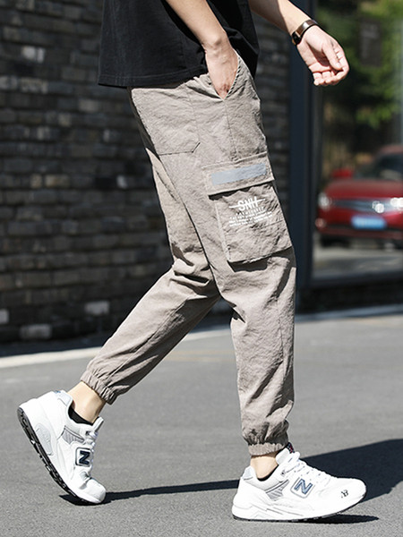 Ikdienas vīriešu bikses ar kabatām un saitēm