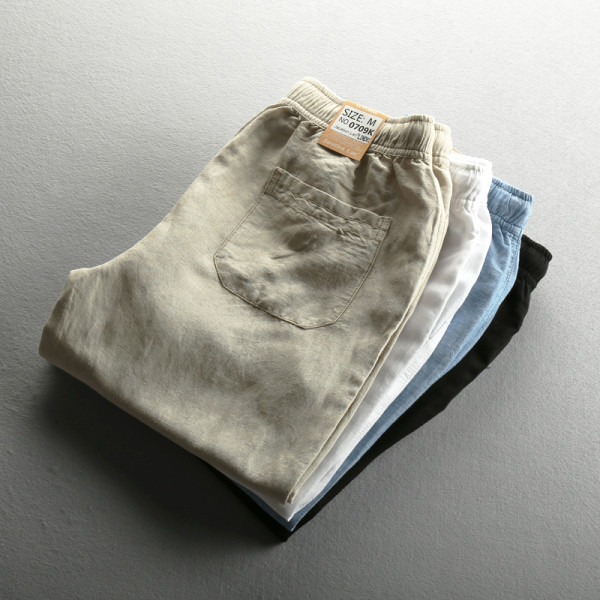 Modernas vīriešu bikses ar elastīgu jostasvietu un saitēm