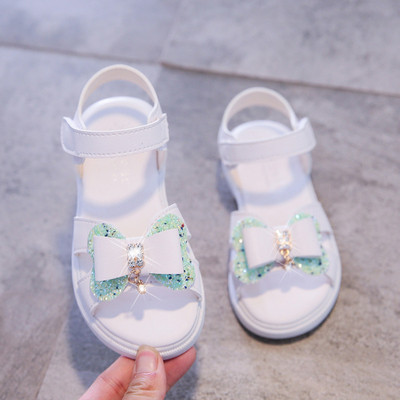 Mūsdienīgas bērnu sandales ar lentīti un akmentiņiem