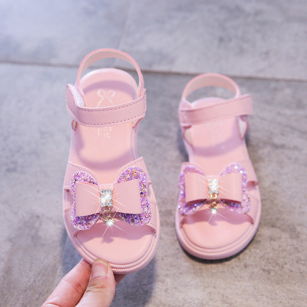 Mūsdienīgas bērnu sandales ar lentīti un akmentiņiem