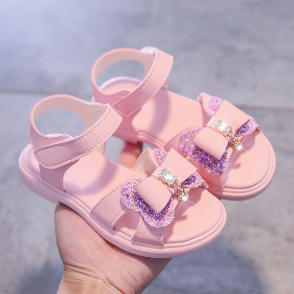 Mūsdienīgas bērnu sandales ar lentīti un akmentiņiem